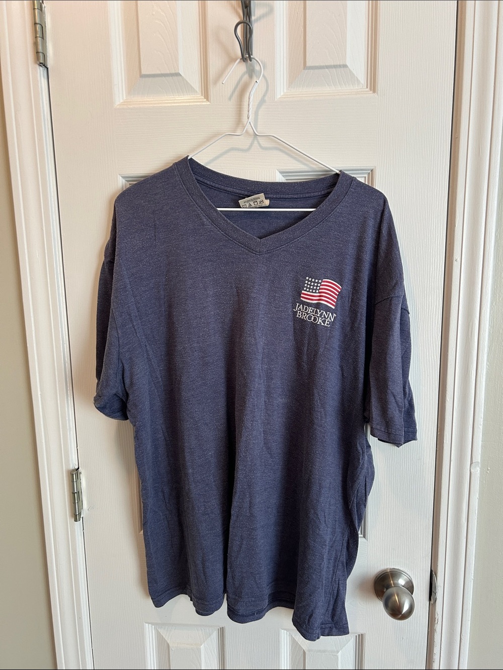 Jadelynn Brooke Navy V-Neck Tee with Flag Chest Logo